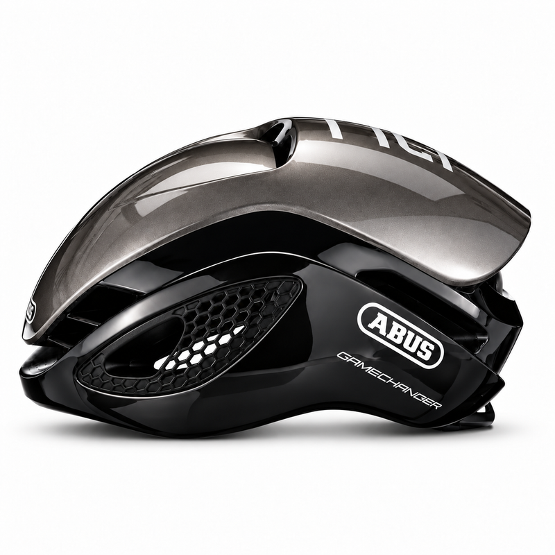 ABUS GameChanger dark grey and black aero cycling helmet, side view with clear GameChanger logo