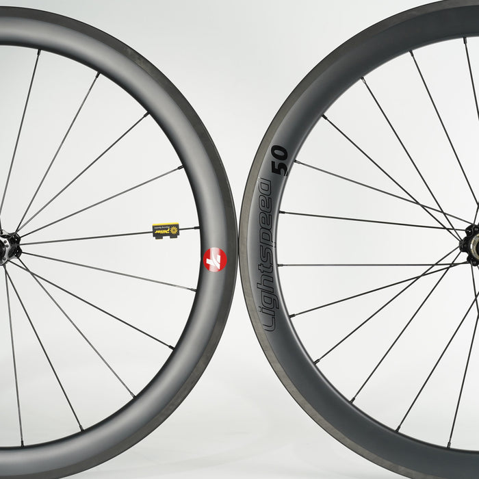 Close-up of LightSpeed 50mm carbon rim-brake wheel rims and branding
